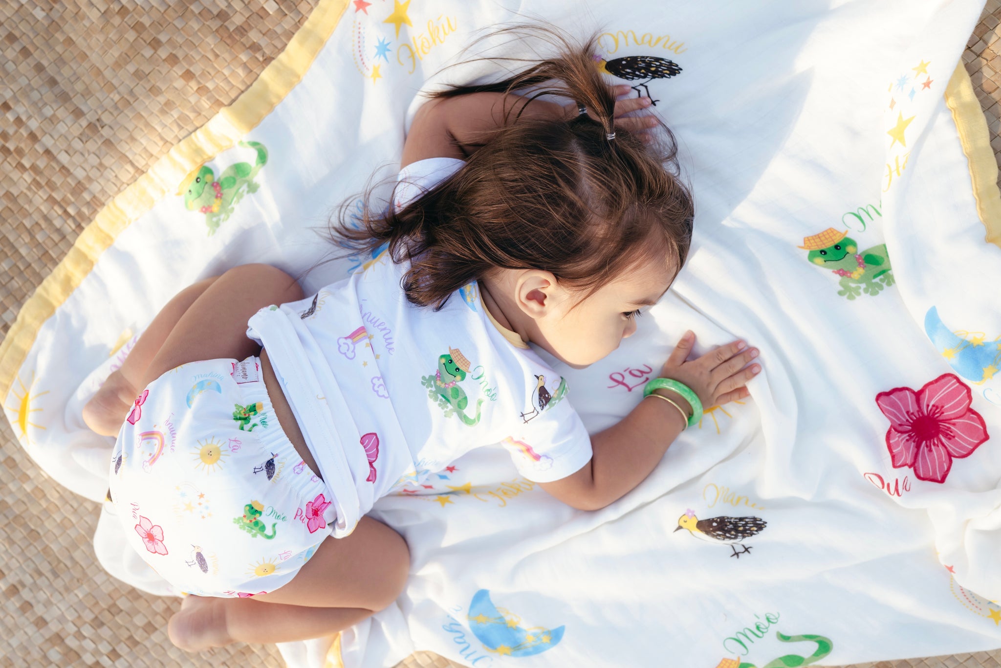 Girl in olelo keiki cloth diaper