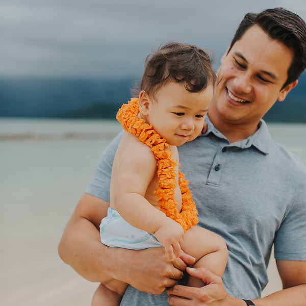Kaleimamo nalu cloth diaper dad holding baby